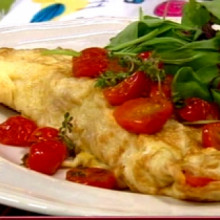 Omelette de tomates asados y pan integral