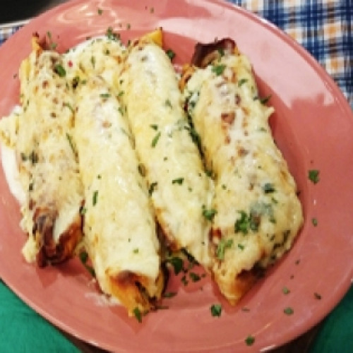 Canelones de espinaca y ricota con dos salsas gratinados