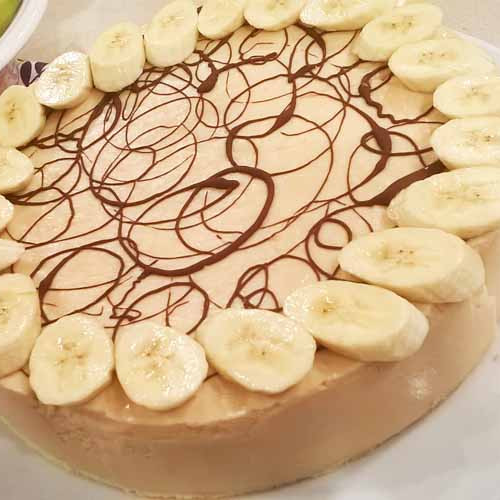 Cheesecake de banana, coco y dulce de leche