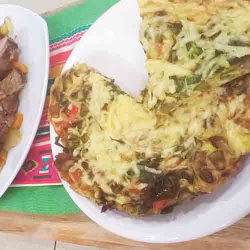 Colita de cuadril braseada con fritata de vegetales