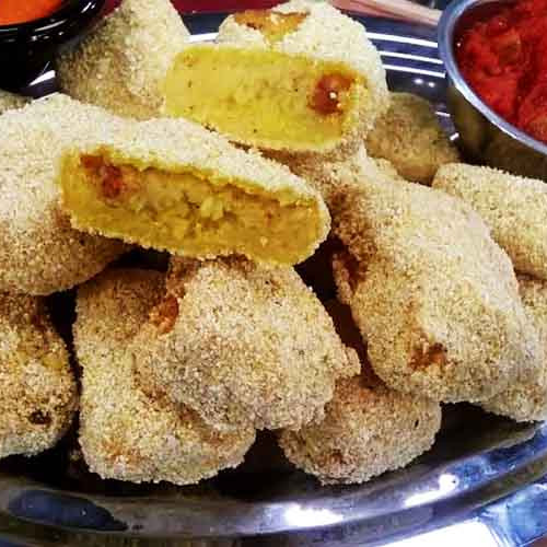 Croquetas de polenta con chorizo colorado y de arroz con espinaca