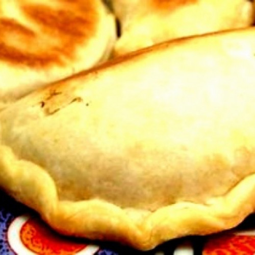 Empanadas de tararira y pastel Paraná