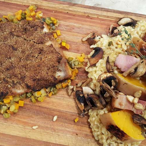 Manta de cerdo en croute de hongos, mirepoix de vegetales y guarnición de trigo