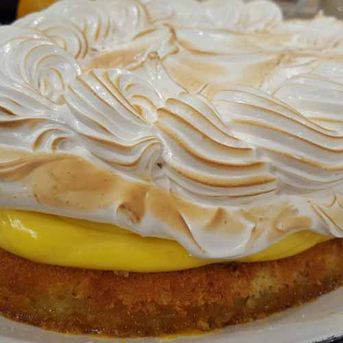 Merengada de mandarina con biscuit de almendras y oliva