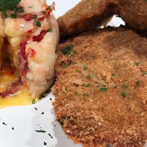 Milanesas de carne rellenas con jamón y queso con puré