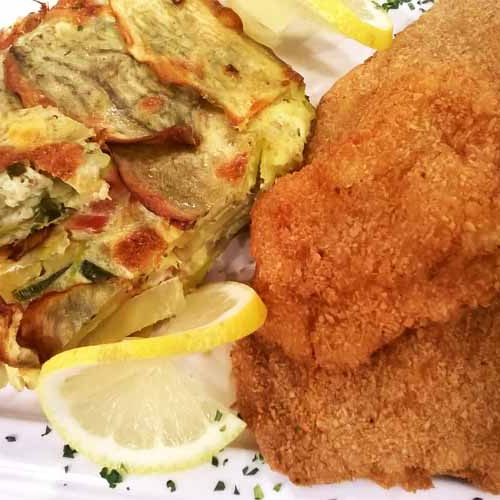 Milanesas de carré de cerdo con mil hojas de batatas