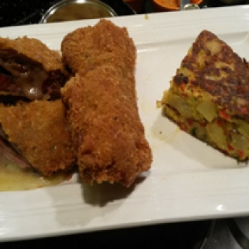 Milanesas rellenas con tortilla de papa