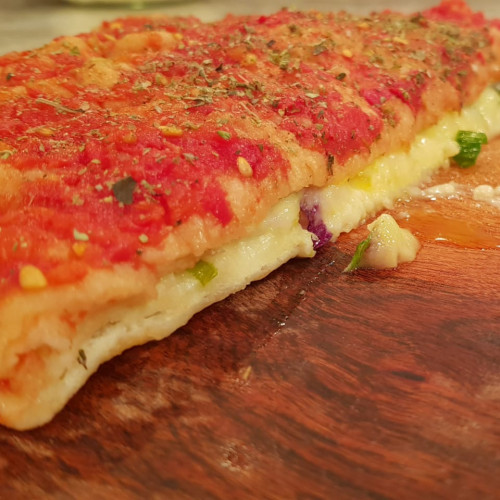 Pizza frita rellena