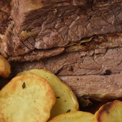 VACÍO AL HORNO CON PAPAS