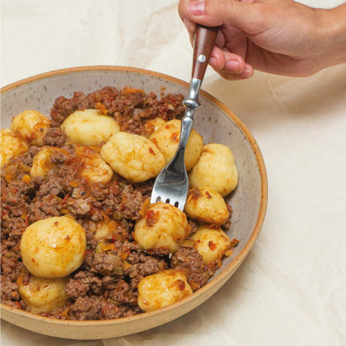 ÑOQUIS DE PAPA RELLENOS DE MOZZARELLA CON SALSA BOLOGNESA