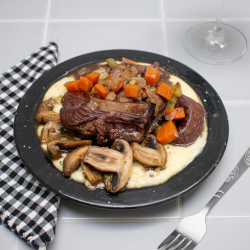 OSSOBUCO CON CREMOSO DE PAPAS Y CHAMPIÑONES