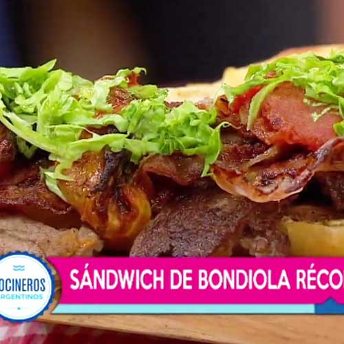 Sándwich de bondiola especiada, hummus y vegetales grillados