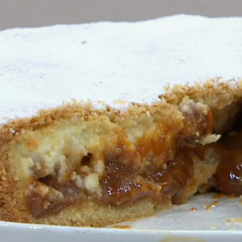 Torta de ricota, dulce de leche y tropezones de nuez