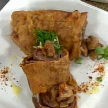 Cañon de carne rebozado con berenjenas a la parmesana