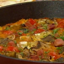 Paella de jamón y alcauciles